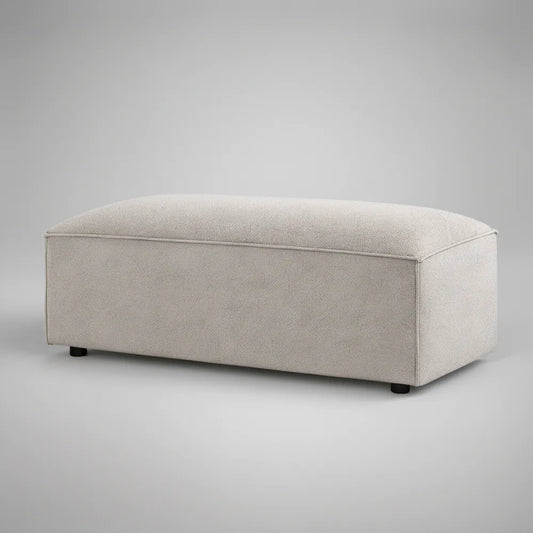 Prostokątny podnóżek tapicerowany bouclé jasnobeżowy z czarnymi nóżkami 100 x 60 x 42 cm